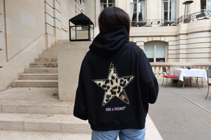 Polerón Negro Estrella Print — Boxy Mujer
